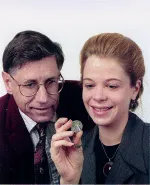 Lisa shows coin